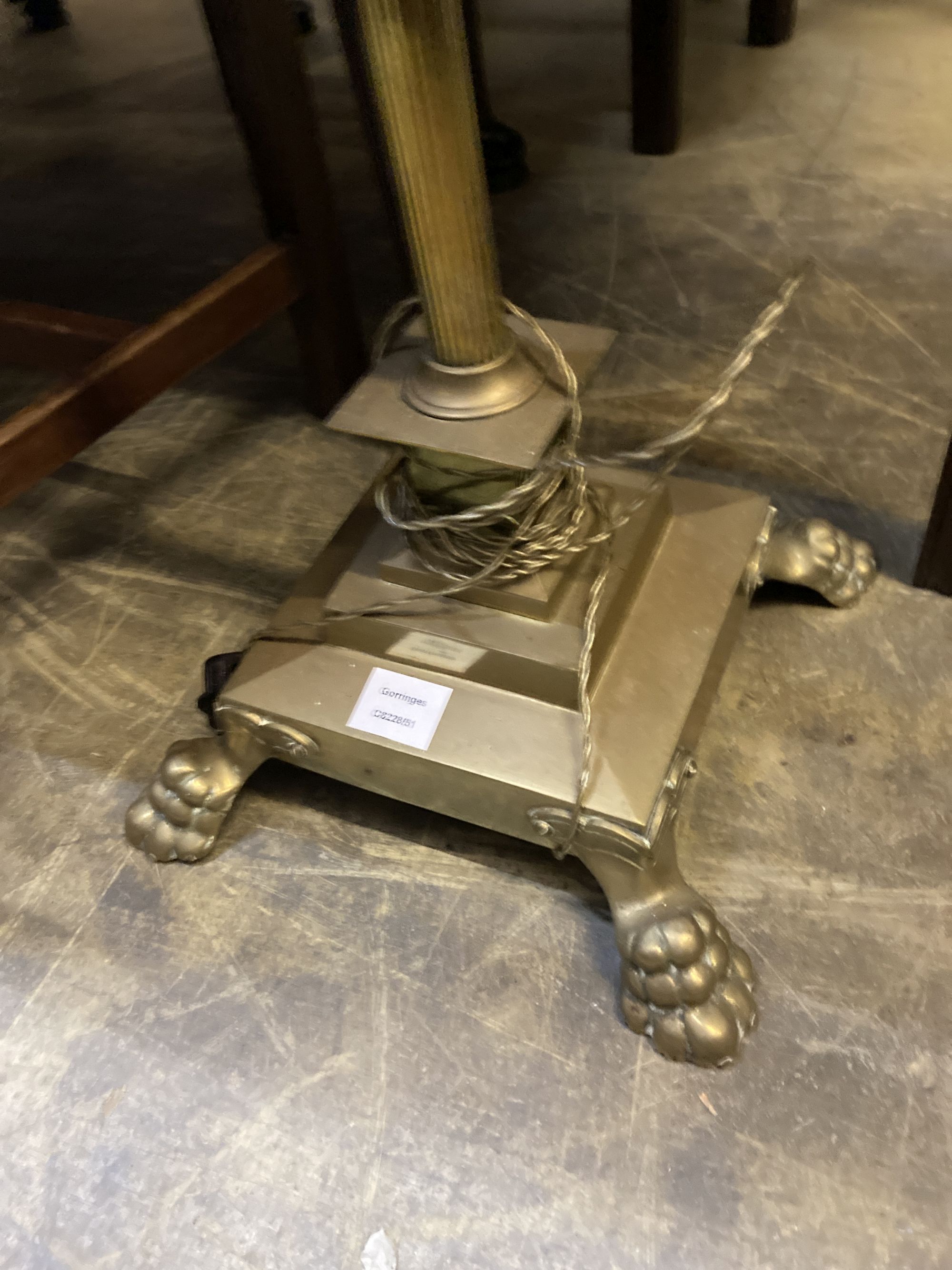 A brass Corinthian column adjustable standard lamp